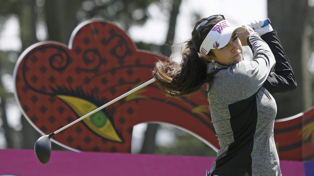 Gerina Piller hits from the second tee of the Lake Merced Golf Club during the third round of the Swinging Skirts LPGA Classic golf tournament Saturday, April 23, 2016, in Daly City, Calif. (AP Photo/Eric Risberg)