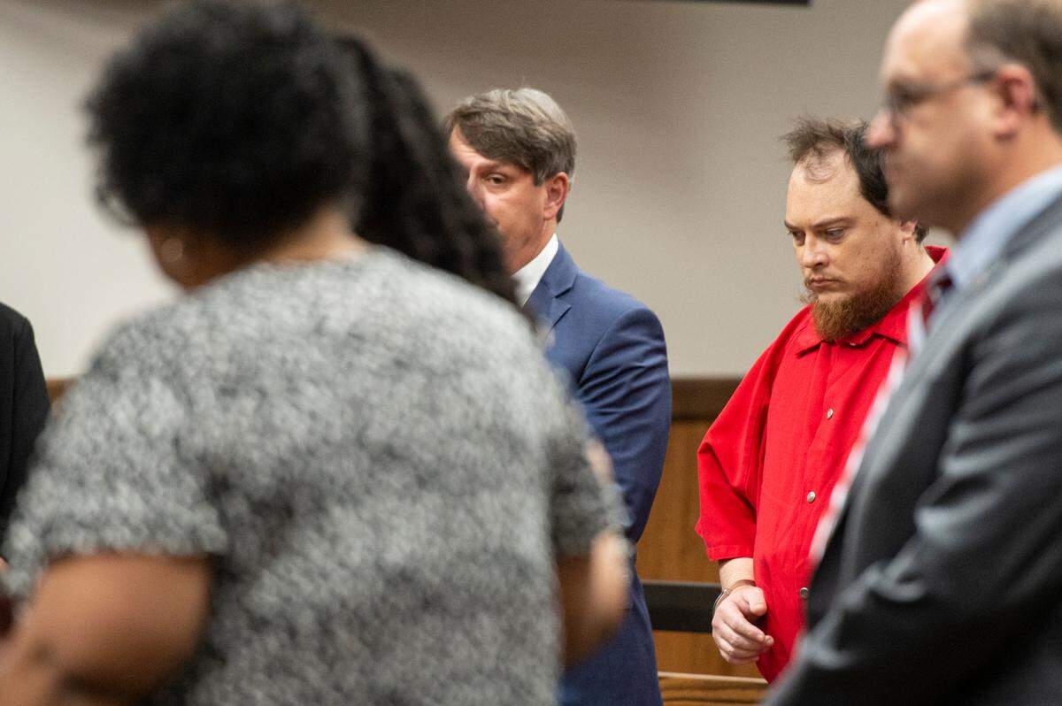 Joseph Rohrbacker listens as family members of Lt. Michael Boutte read letters describing how Boutte’s loss has impacted them during Rohrbackers guilty plea and sentencing for the killing of Boutte at Harrison County Circuit Court in Gulfport on Monday, July 31, 2023.