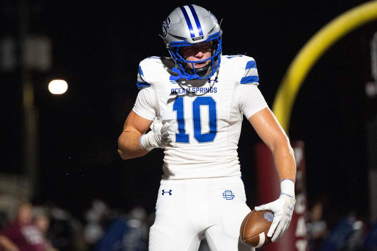 Ocean Springs tight end Hayden Berglind (10) celebrates after scoring Friday against Picayune.