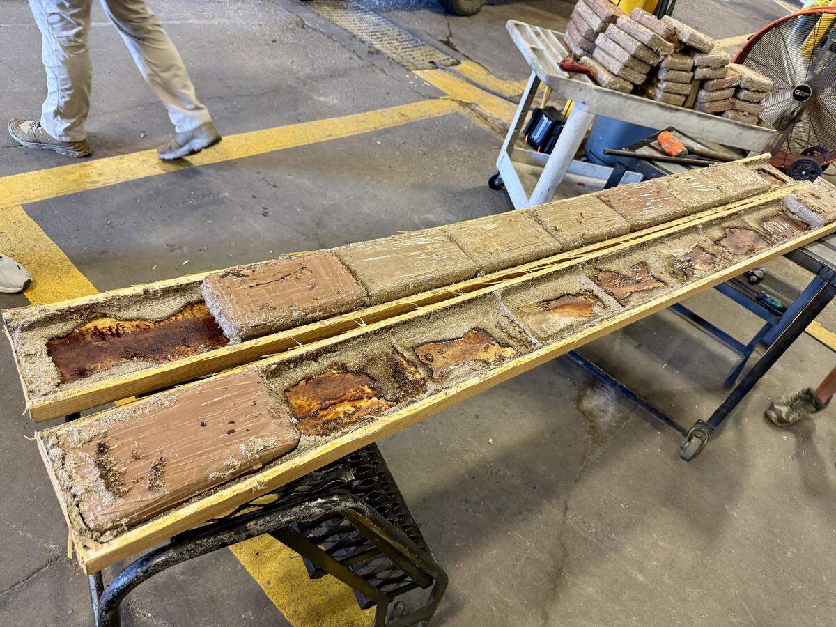 The Harrison County Sheriff’s Office said deputies found 118 pounds of cocaine concealed in a wooden compartment inside a van.