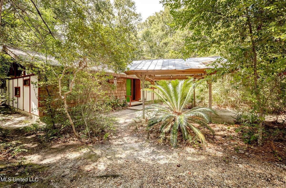 Carroll Ishee, whose name and work are familiar along the Mississippi Gulf Coast, designed and built this midcentury modern home in Ocean Springs. The three bedroom, two bath home is on the market for $459,000.