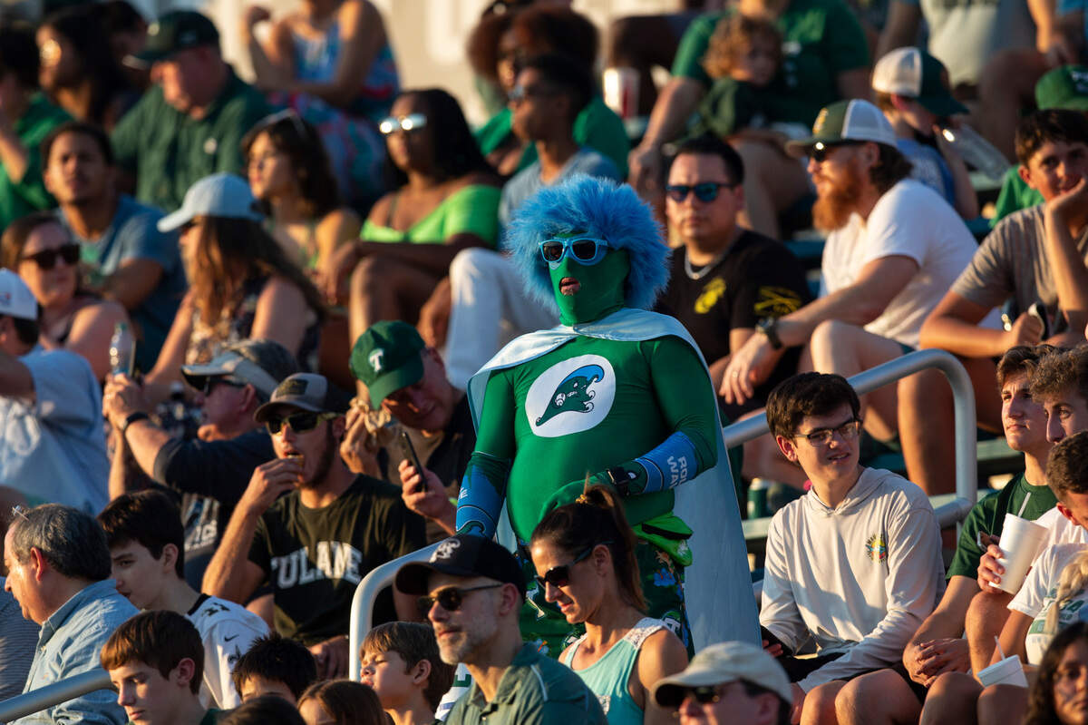 A man wears a Green Wave costume during a matchup between Southern Miss and Tulane at Yulman Stadium in New Orleans on Saturday, Sept. 24, 2022.