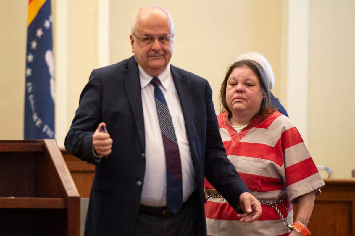 Angela James stands with her attorney Jim Gray as she appears in Hancock County Circuit Court to plead guilty on Monday, June 17, 2024. James pled guilty to manslaughter in the death of Katie Cash after a fatal 2021 crash.
