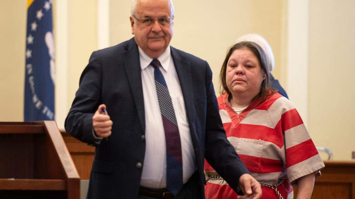 Angela James stands with her attorney Jim Gray as she appears in Hancock County Circuit Court to plead guilty on Monday, June 17, 2024. James pled guilty to manslaughter in the death of Katie Cash after a fatal 2021 crash.