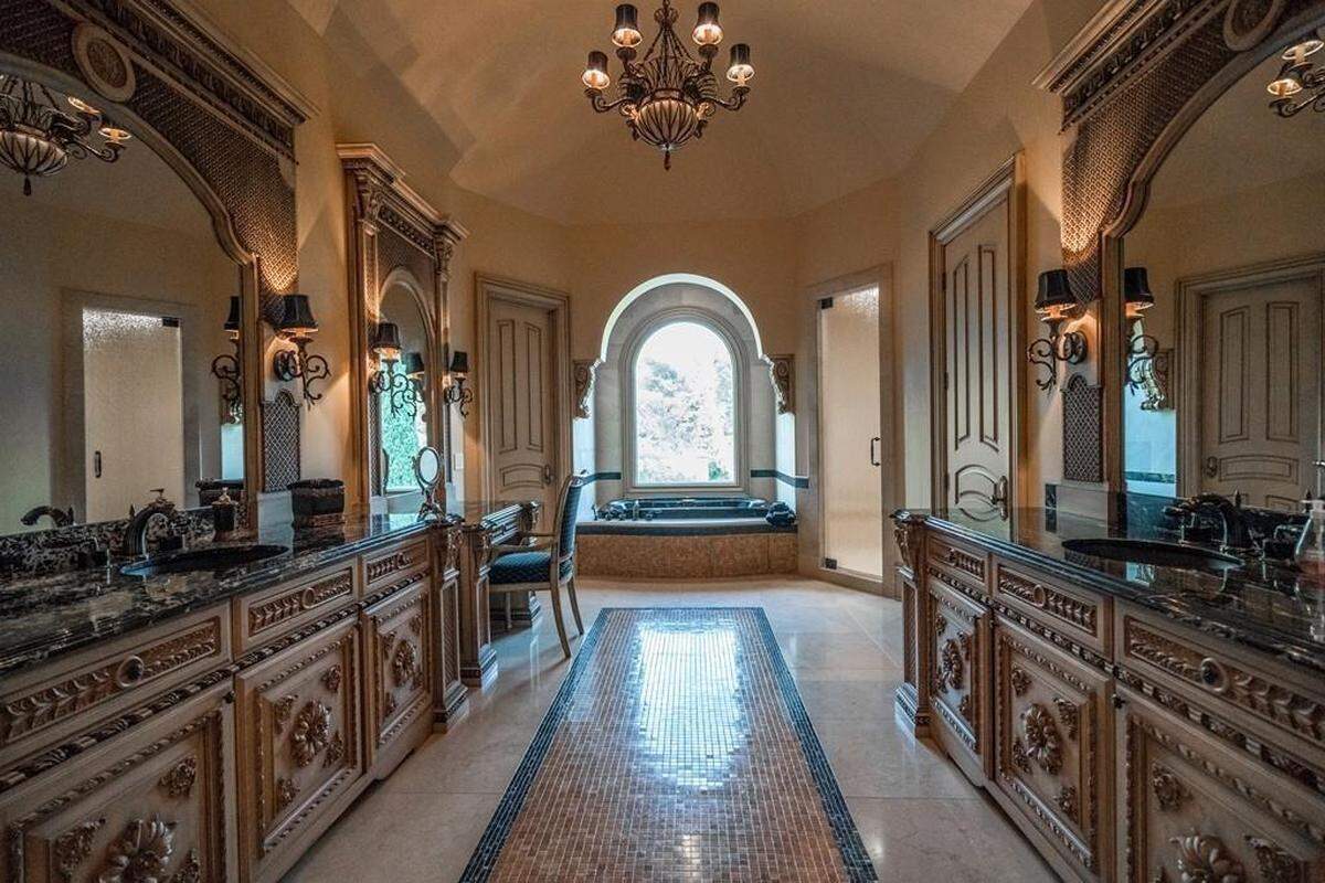 The megamansion features 12 bathrooms, including six half bathrooms.
