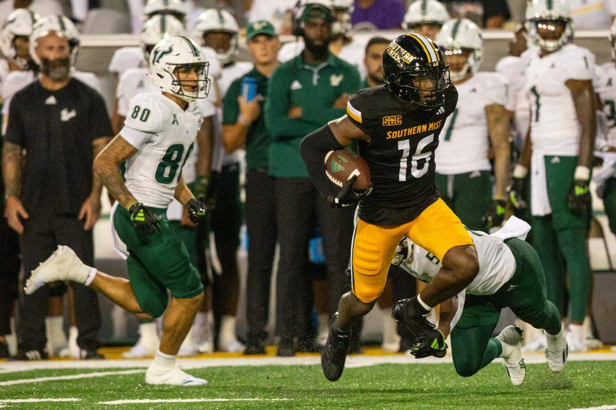 Southern Miss Golden Eagles wide receiver TK Keyes (16) runs the ball during a game between Southern Miss and South Florida at M.M. Roberts Stadium in Hattiesburg on Saturday, Sept. 14, 2024.