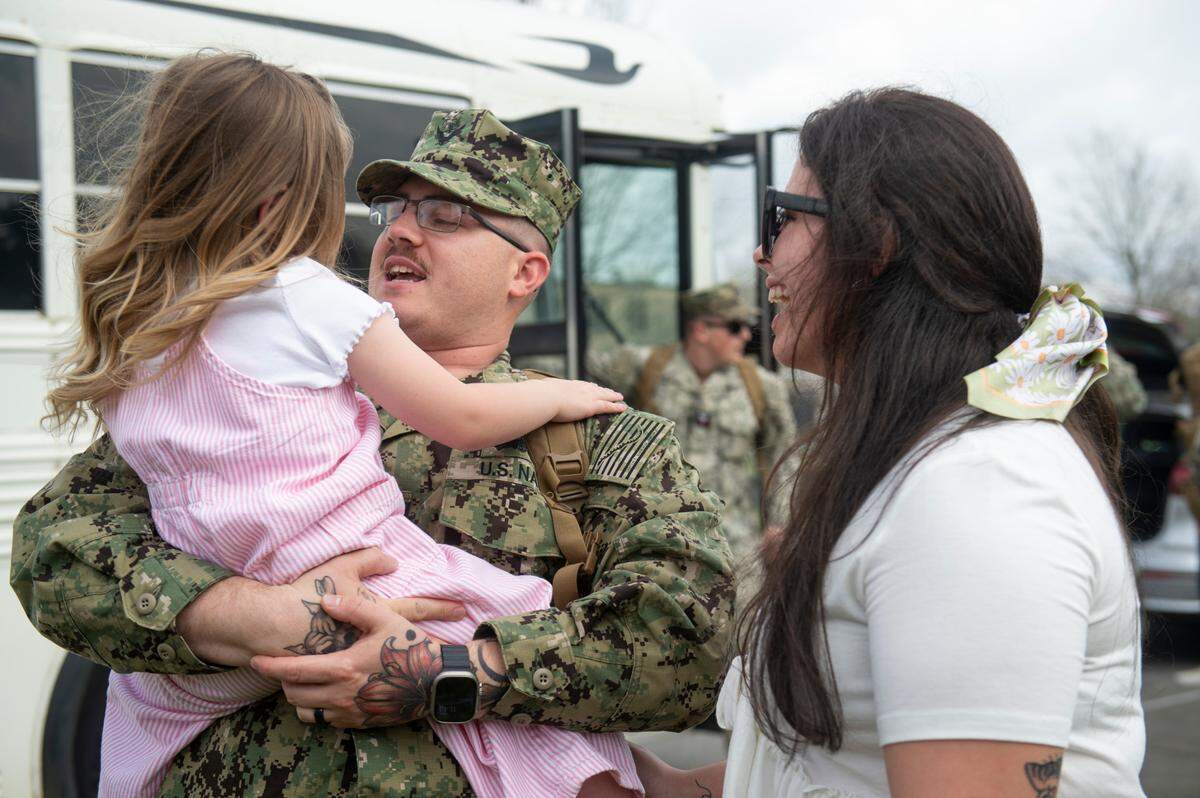 Families are reunited with members of Naval Mobile Construction Battalion 1 as they return home from deployment on Thursday, March 13, 2025, to Naval Construction Battalion Center Gulfport.