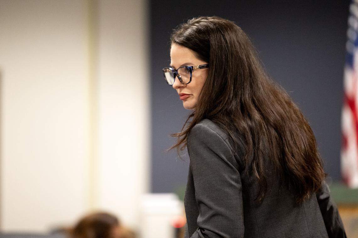 Assistant District Attorney Carolyn Lewis walks to the stand during a murder and assault trial Tuesday at Jackson County Circuit Court.