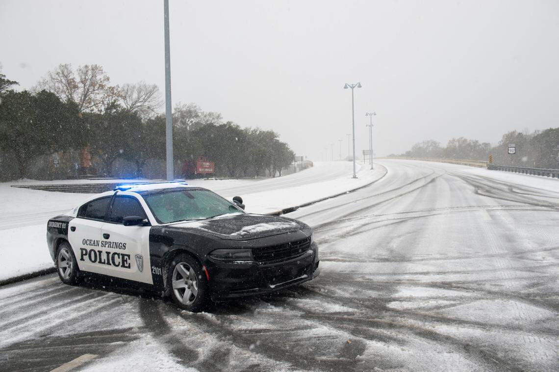 Police close off the Ocean Springs-Biloxi bridge due to snow on Tuesday, Jan. 21, 2025.