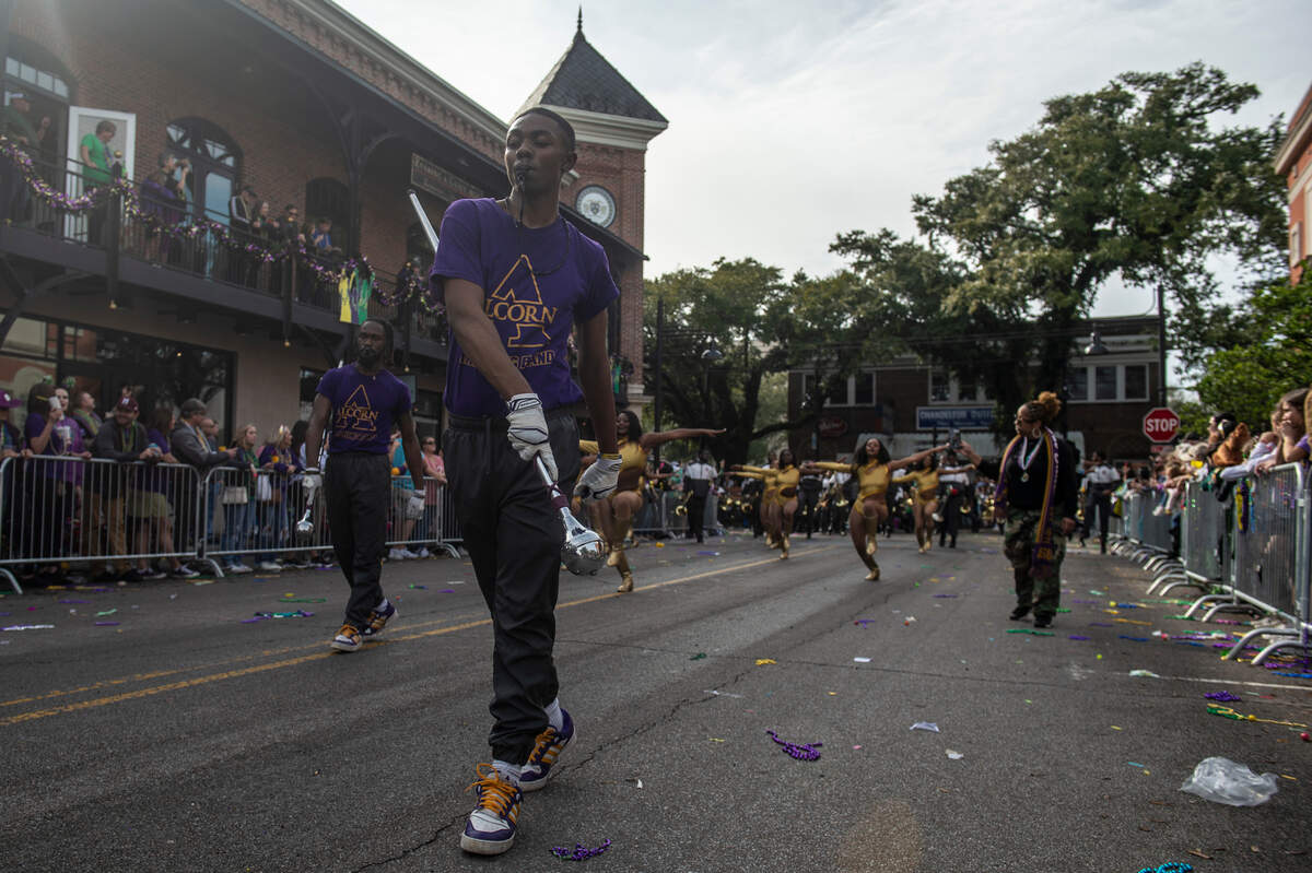 Members of the Alcorn State Marching Band march down Government during the Krewe of Unique Parade following The Ocean Springs Elks Carnival Parade in downtown Ocean Springs on Saturday, Jan. 27, 2024.