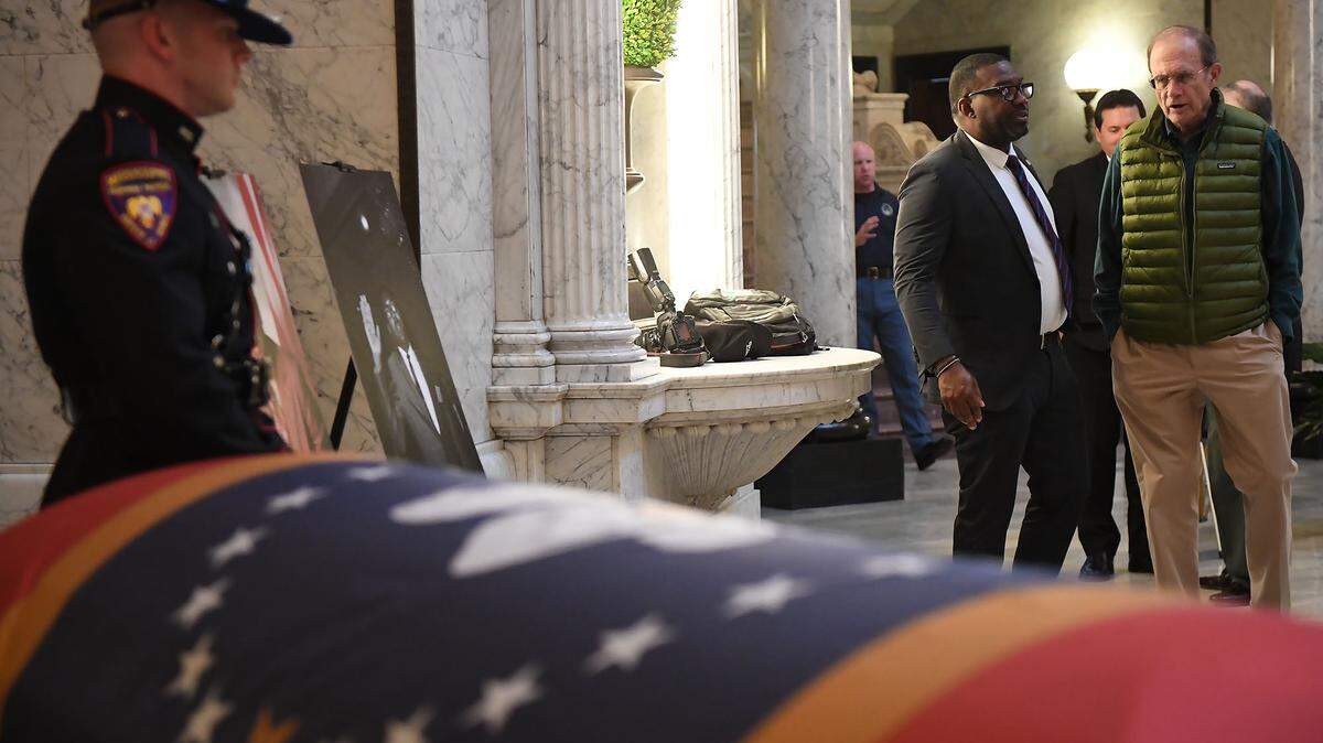 Rep. Bryant Clark (center) chats with Lt. Gov. Delbert Hosemann, Sunday, March 9, 2025, in the State Capitol Rotunda where Rep. Clark’s father, Robert Clark, Jr. lies in repose. Robert Clark, Jr. a former State Representative and House Speaker Pro Temp Robert Clark, Jr., was also the first Black legislator in the state since Reconstruction.