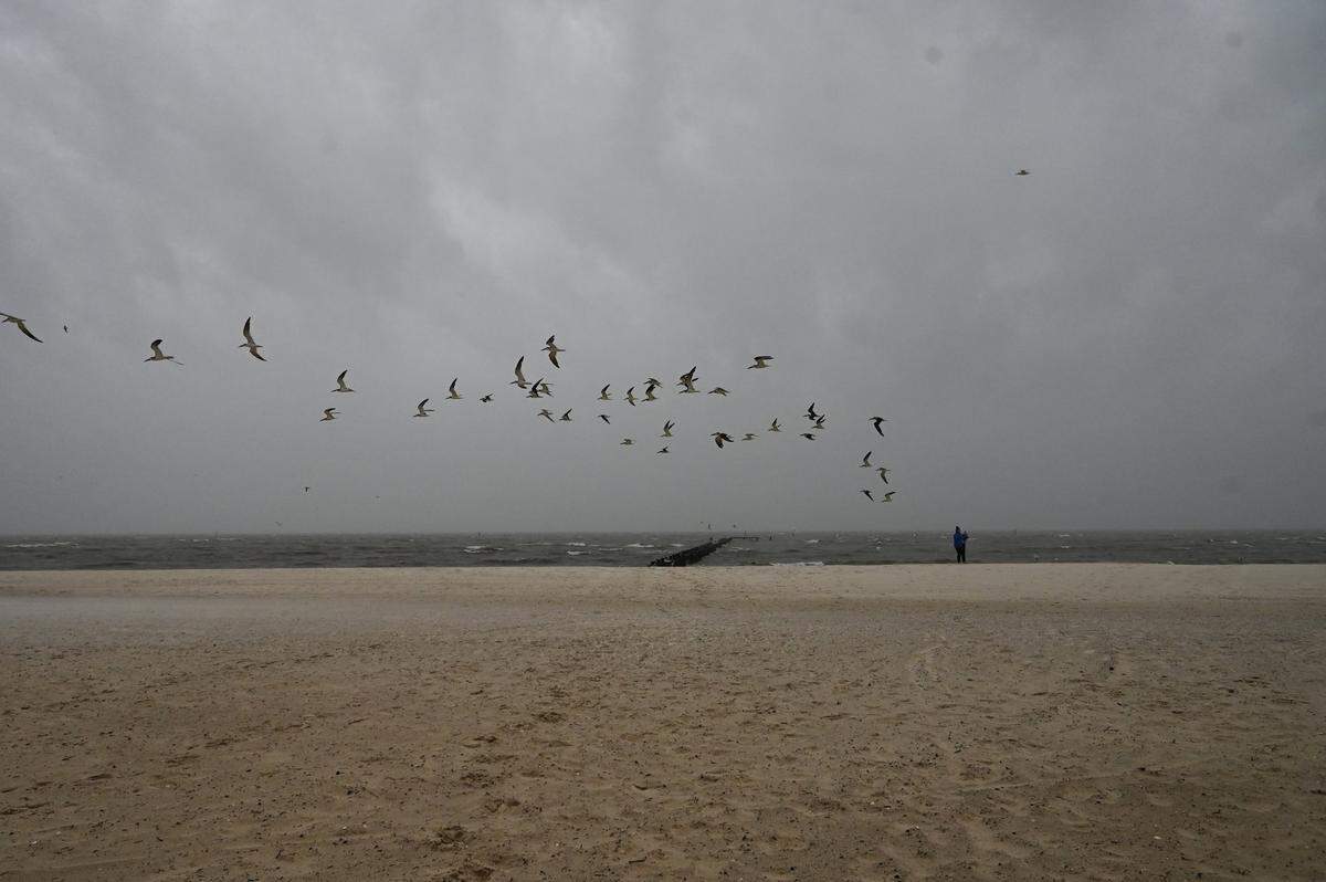 Hurricane Zeta drew weather watchers to the beaches in Biloxi before rainfall started Wednesday, Oct. 28, 2020.