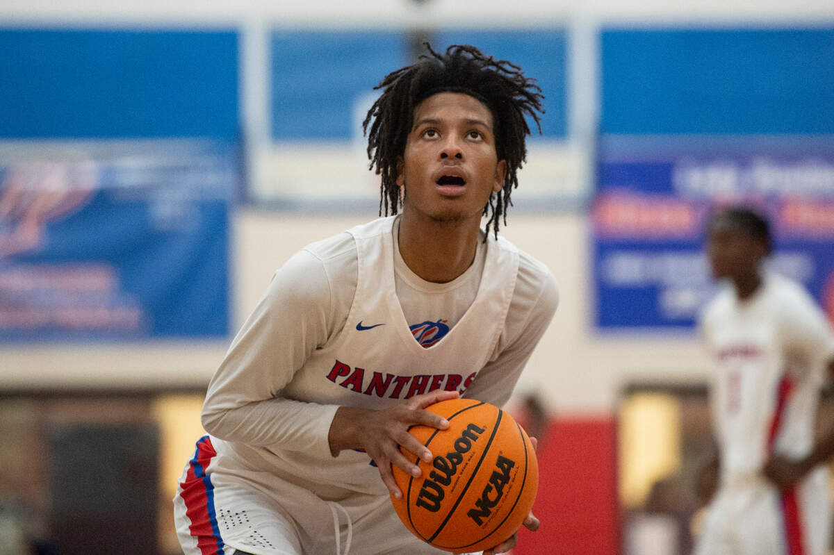 Pascagoula’s Pete Millender looks to shoot a free throw during a game against Pass Christian at Pascagoula High School on Tuesday, Dec. 20, 2022.