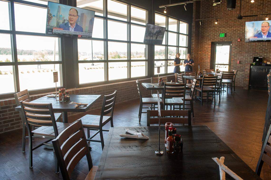 Televisions are mounted in the wall of windows at Walk-On’s Sports Bistreaux in D’Iberville.