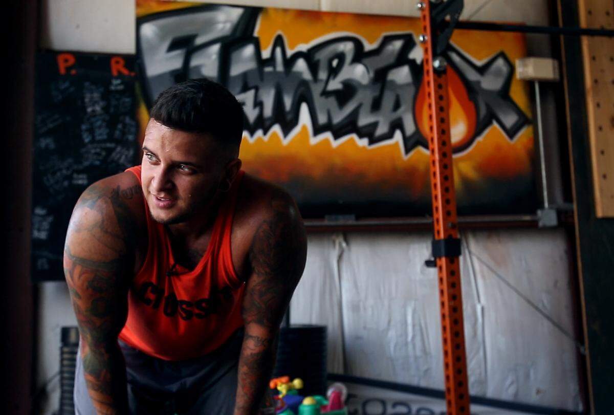 Dillon King works out at his CrossFit gym, Flambeaux CrossFit, on Friday, June 29, 2018, in Metairie, A large reason that King and his wife, Missy, decided to open gym was to provide a safe space for LGBTQ people to work out and stay healthy. 