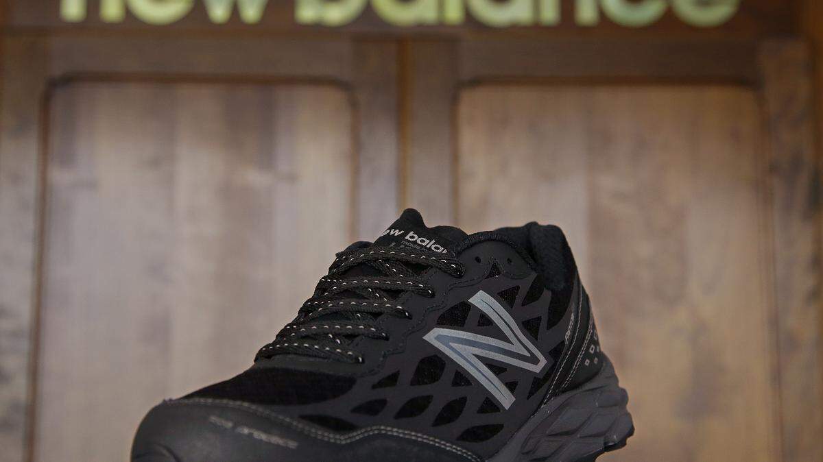 In this photo taken Wednesday, July 1, 2015, the New Balance proposed 950v2 sneaker, that has passed military testing, is displayed at one of company's manufacturing facilities in Boston. New Balance is pressing the Pentagon to buy American-made footwear for the troops instead of sneakers from rival Nike that are made in China. (AP Photo/Stephan Savoia)