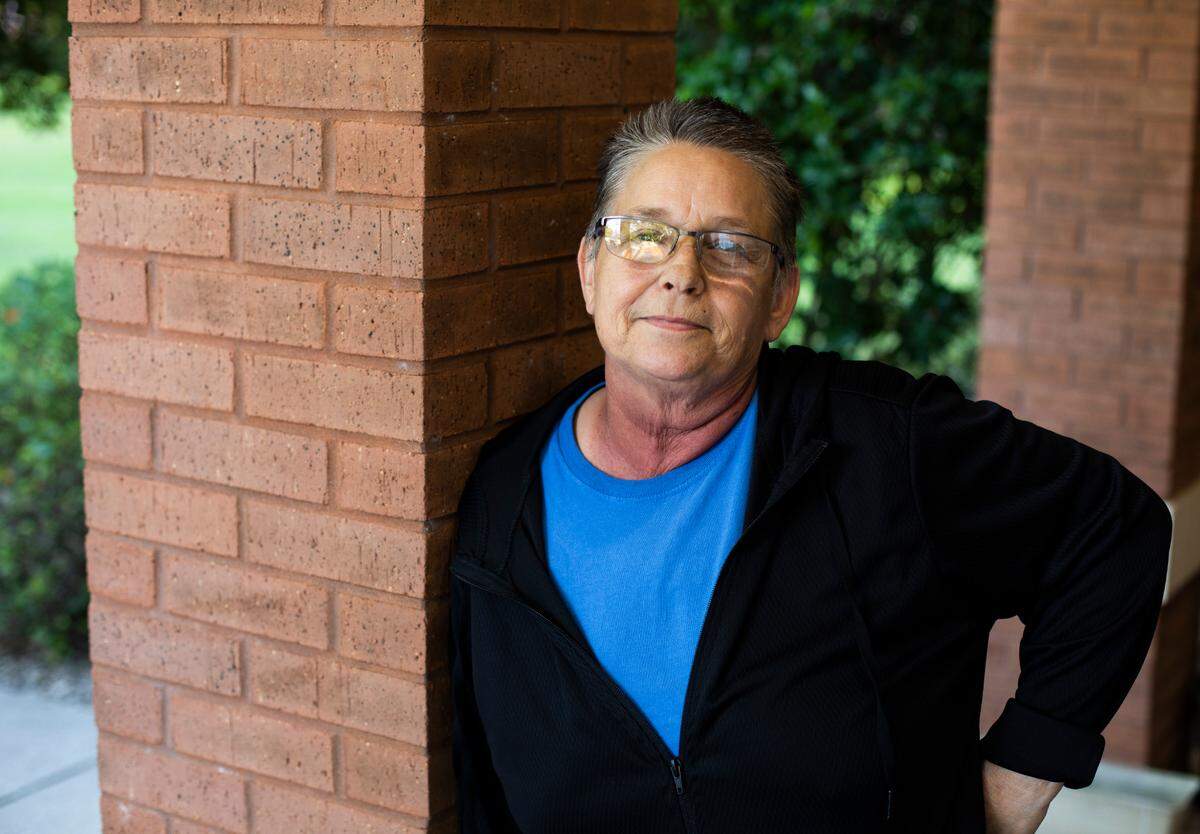 Lynn Koval, owner of Just Us Lounge in Biloxi, is fighting stage four cancer. The radiation burns her neck and makes it hard to swallow and speak.