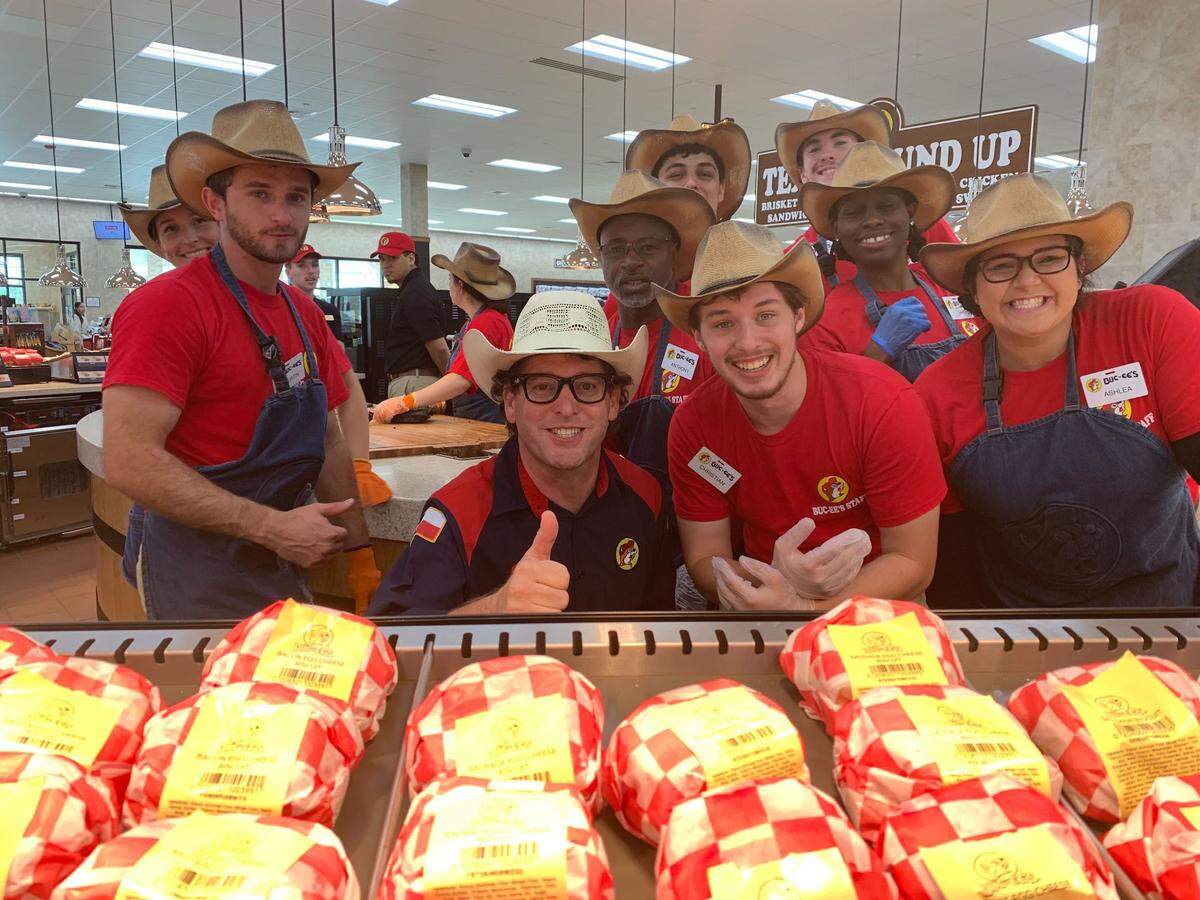 Director of Bar-B-Que Operations Randy Paully (center) was everywhere Monday at the new Harrison County Buc-ee’s, including here with some of the team responsible for the famous brisket.