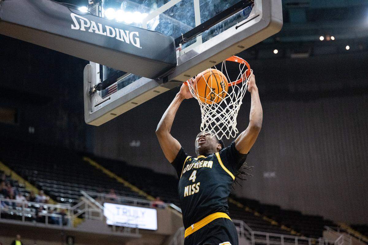 Southern Mississippi forward Tylik Weeks (4) dunks Saturday against Ole Miss.