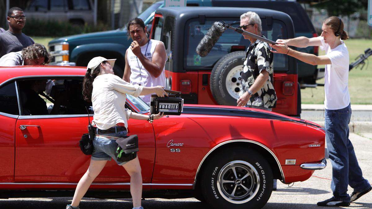 JOHN FITZHUGH/SUN HERALD 
 Crew members prepare to shoot a scene during the first day of filming of 'Artists Die Best in Black' in Biloxi on Monday June 17, 2013. The world premier of the movie, which was filmed entirely in South Mississippi, is Sunday at Saenger Theater in Biloxi.