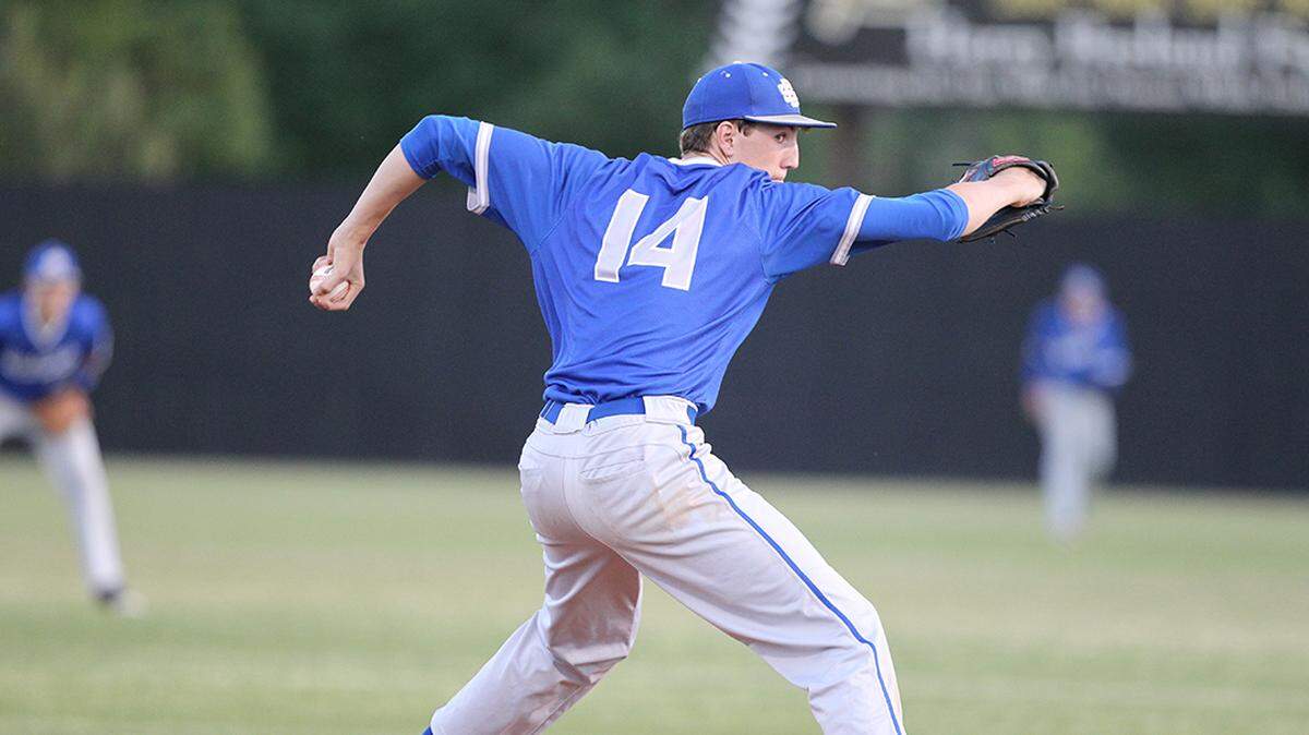 CHUCK LICK/PineBeltSports.com 
 Ocean Springs left-hander Garrett Crochet pitches against Oak Grove in Hattiesburg Monday night.