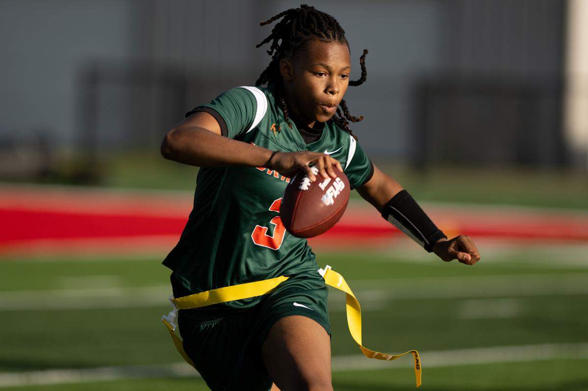 West Harrison’s Jaza’Yah Craighead (3) runs with the ball during a flag football game at Harrison Central High School on Thursday, April 23, 2026.