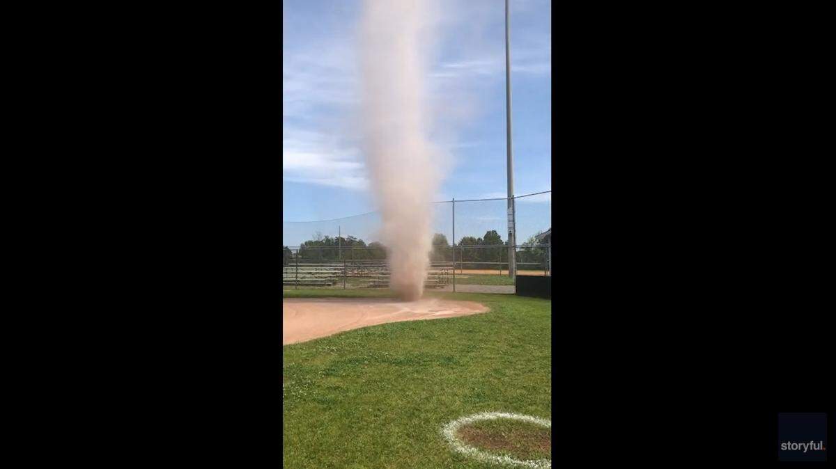 A softball coach in Pleasant Grove, Alabama, captured the moment a large dust devil formed on the field before disappearing.