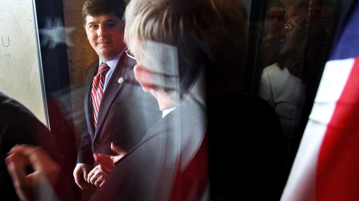 AMANDA McCOY/SUN HERALD/2011Congressman Steven Palazzo greets constituents and supporters at the door of his new district office in downtown Gulfport on Monday, February 7. On Thursday, Palazzo said he disagreed with the government's decision to allow female soldiers in combat roles, calling it dangerous.