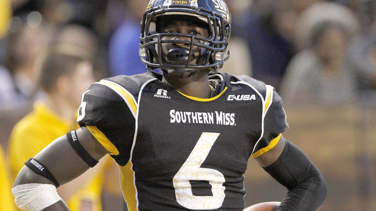 TIM ISBELL/SUN HERALD 
 Southern Miss receiver Marquise Ricard strikes a pose after catching a Nick Mullens touchdown pass in 2014.