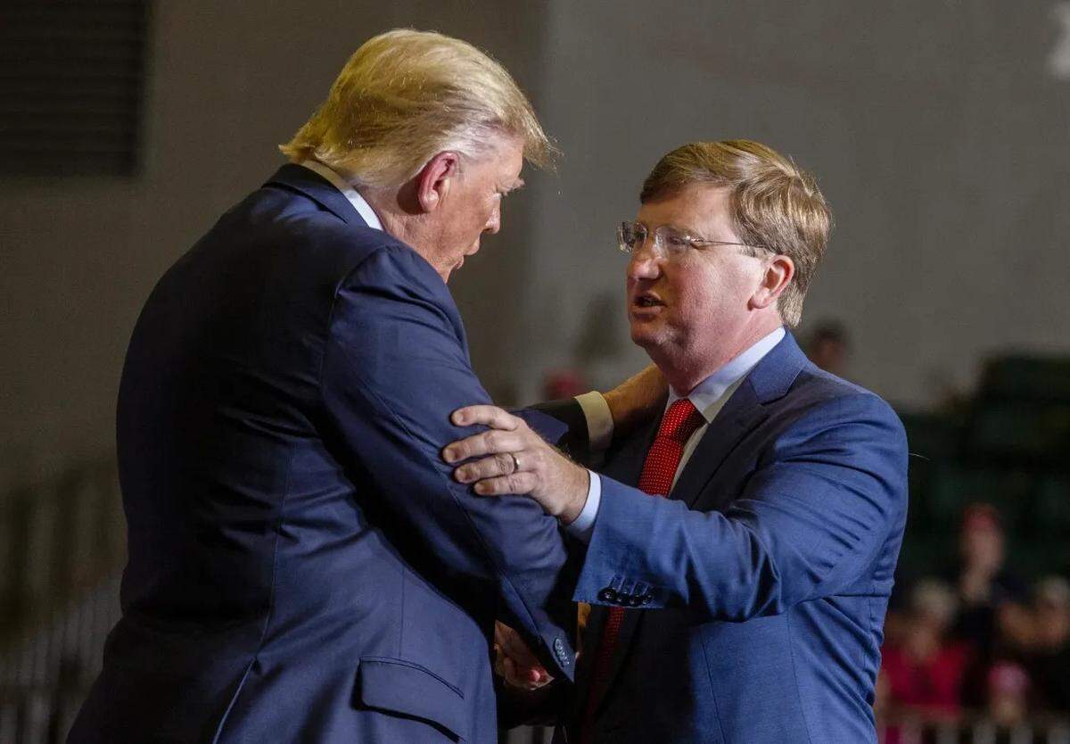 President Donald Trump embraces Lt. Gov. Tate Reeves during a 2019 campaign rally at BancorpSouth Arena in Tupelo.
