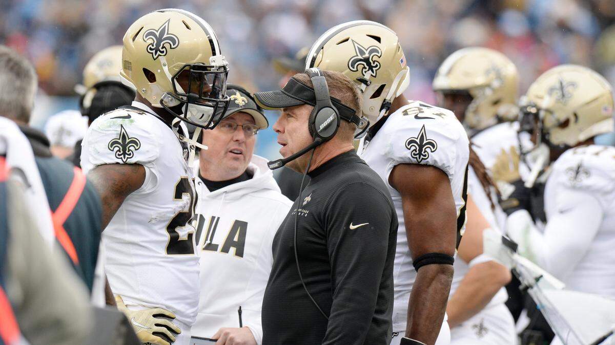 New Orleans Saints head coach Sean Payton, center, talks with players in the first half of an NFL football game against the Tennessee Titans Sunday, Dec. 22, 2019, in Nashville, Tenn.