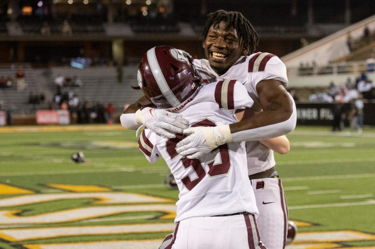 Picayune players celebrate after winning the 5A State Championship at M.M. Roberts Stadium in Hattiesburg on Friday, Dec. 2, 2022.