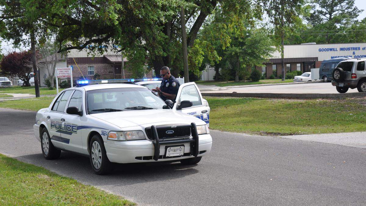 Gulfport police officers close down a crime scene on 31st Street near 24th Avenue where a man was found with a gunshot wound Saturday afternoon.
