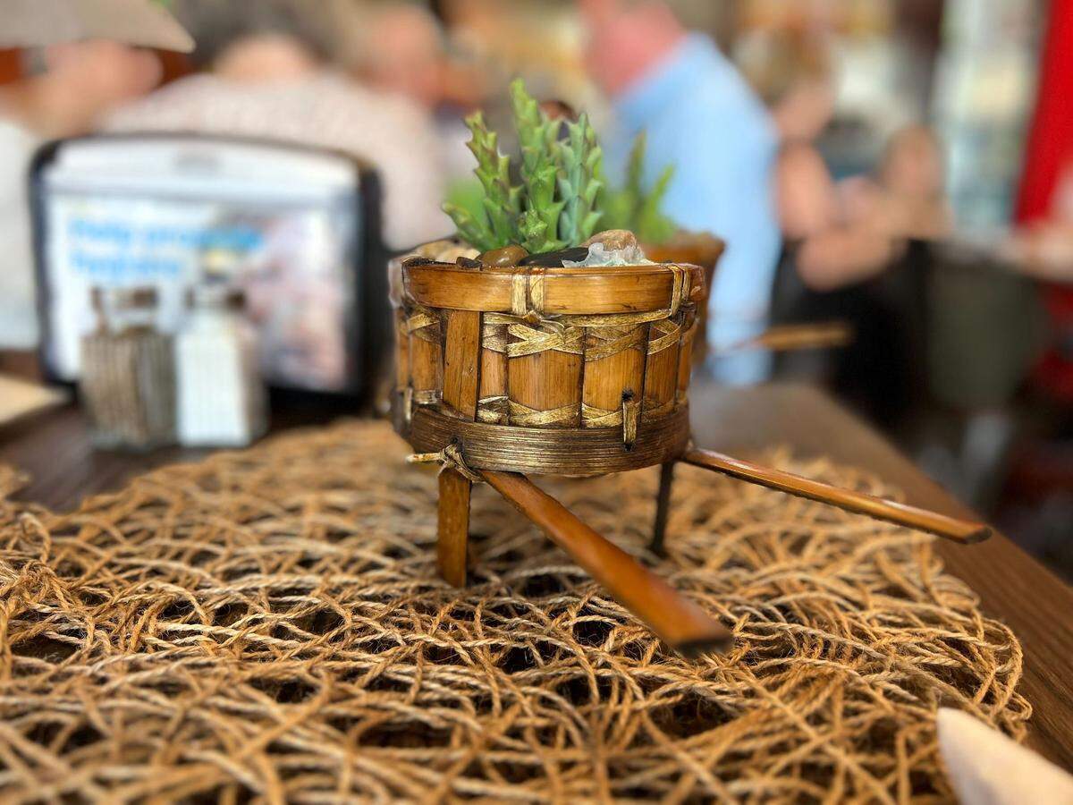 Wicker and woven placements lend to the Old World Mexico vibe of El Chilango in Gulfport, Mississippi.