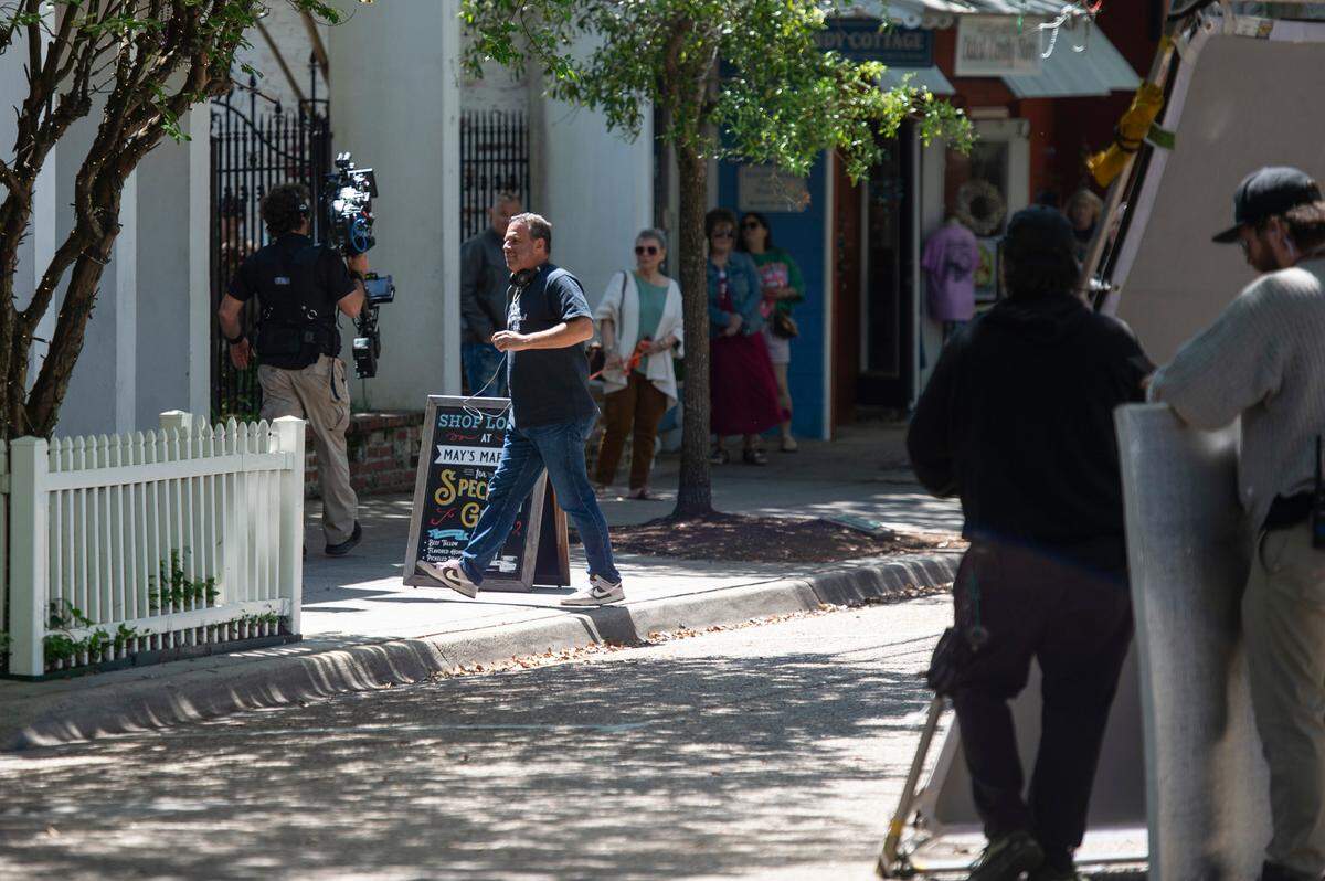 Cash Out 3 director Randall Emmett walks in front of The Lady May on Washington Avenue in Ocean Springs on Tuesday, April 8, 2025, during the filming of Cash Out 3.