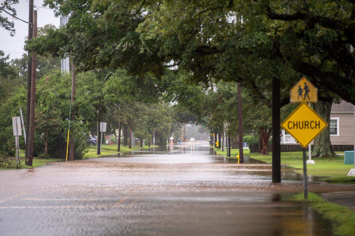 Flash floods covered Live Oak Avenue in Pascagoula on Monday, Aug. 30, 2021 due to Hurricane Ida.