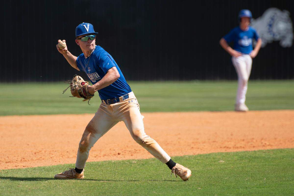 Vancleave infielder Asher Henley throws the ball during practice at Vancleave High School in Vancleave on Tuesday, April 30, 2024.