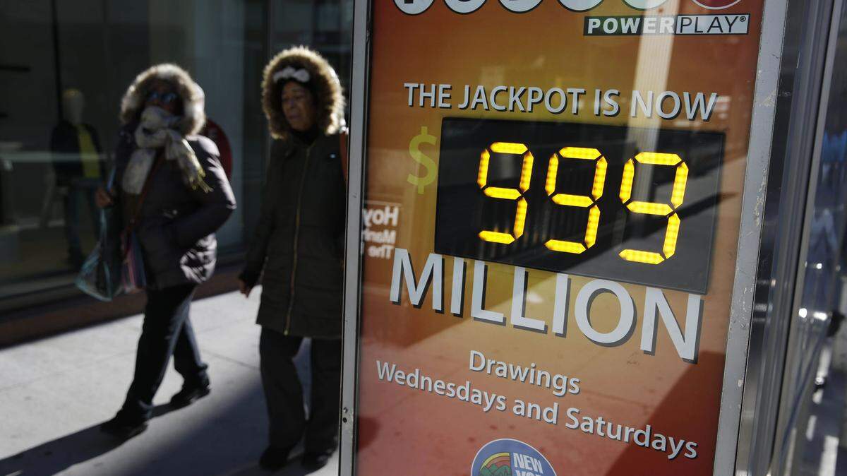 SETH WENIG/ASSOCIATED PRESSA sign advertises the Powerball lottery in New York on Monday. The jackpot is so big that billboards around the country have to advertise the prize as $999 million because they're not built to show billions. A jackpot that high can be a problem for compulsive gamblers, experts say.