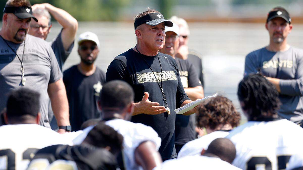 New Orleans Saints head coach Sean Payton talks to players during practice in Metairie, La., on Thursday.