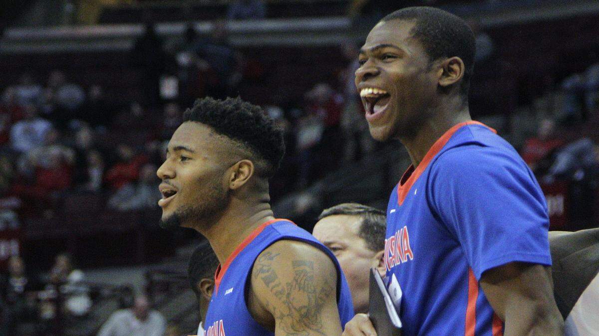 Louisiana Tech's Dayon Griffin, left, and Derric Jean celebrate as time runs off the clock against Ohio State during the second half of an NCAA college basketball game Tuesday, Nov. 24, 2015, in Columbus, Ohio. Louisiana Tech beat Ohio State 82-74. (AP Photo/Jay LaPrete)