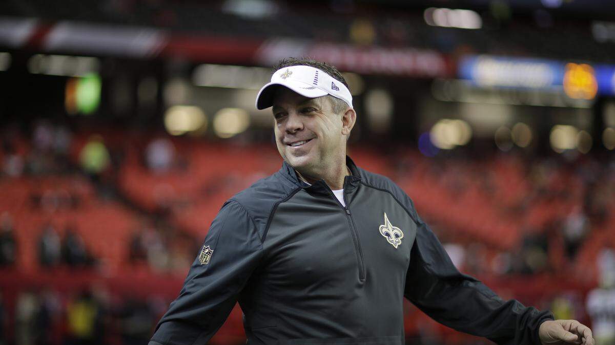 New Orleans Saints head coach Sean Payton walks on the turf before the first half of an NFL football game against the Atlanta Falcons, Sunday, Jan. 3, 2016, in Atlanta. (AP Photo/David Goldman)
