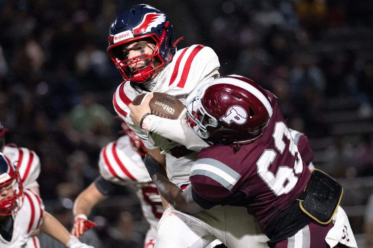 The Picayune defense made things touch on Hancock quarterback Kaison Koenenn (3) all night Friday.