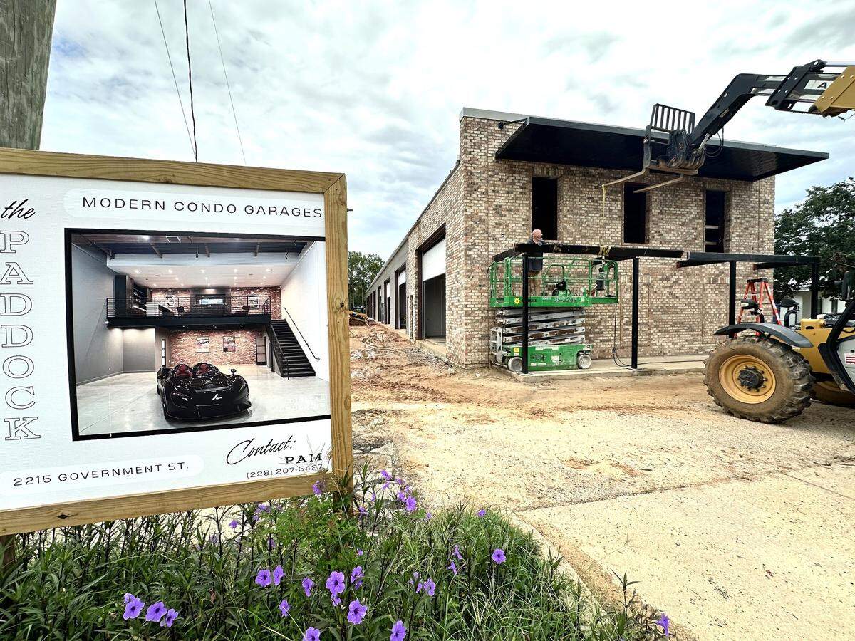 The Paddock luxury condo garage is under construction on Government Street in downtown Ocean Springs. A balcony across the front will be a hot spot to watch the day and night Mardi Gras parades as they pass and the fenced-in back yard will host private parties and fundraisers.