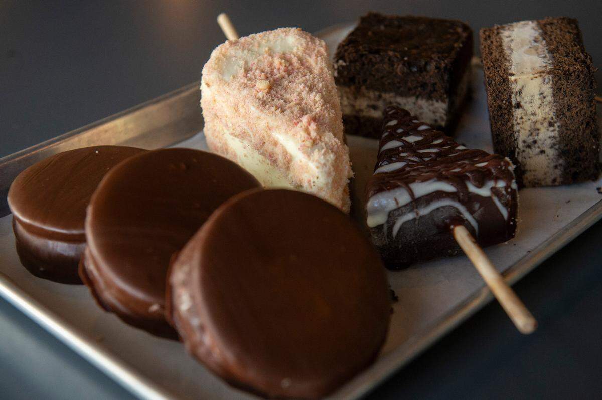 Moon pies, strawberry crunch cheesecake on a stick and triple chocolate cheesecake on a stick, and coffee and cookies and cream ice cream are some of the desserts being served at The Garage at Cash Alley in Ocean Springs.