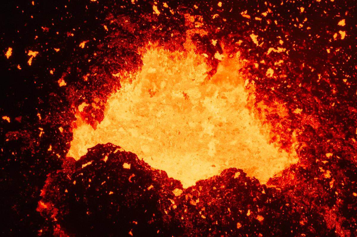 A close up view inside the active vent of the volcano in Grindavik on Iceland’s Reykjanes Peninsula, Wednesday, Dec. 20, 2023. (AP Photo/Marco Di Marco)