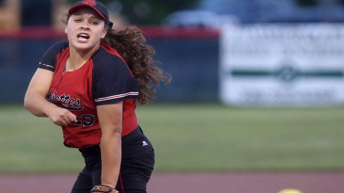 AMANDA McCOY/SUN HERALD 
 Harrison Central's Madison Burge was the winning pitcher and knocked in five runs Tuesday against Ocean Springs.