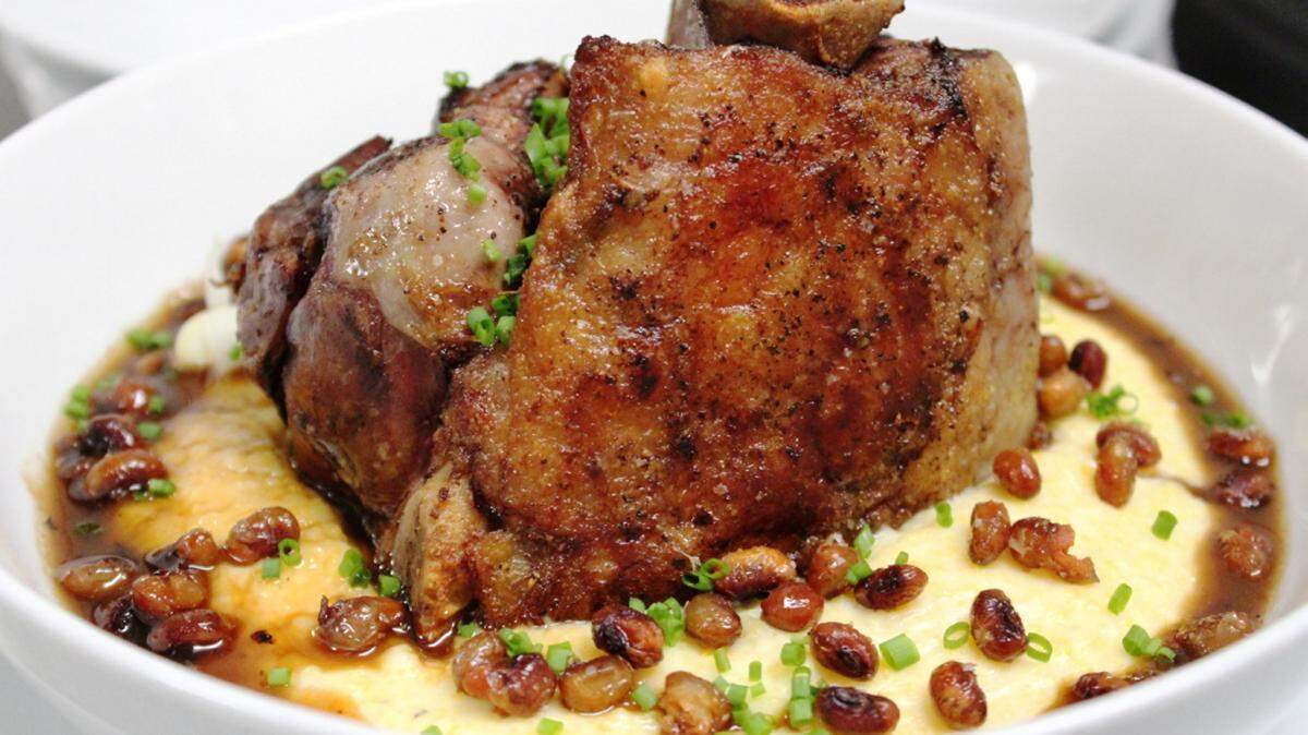 JULIAN BRUNT/SPECIAL TO THE SUN HERALDLamb chops are best grilled over a wood fire.