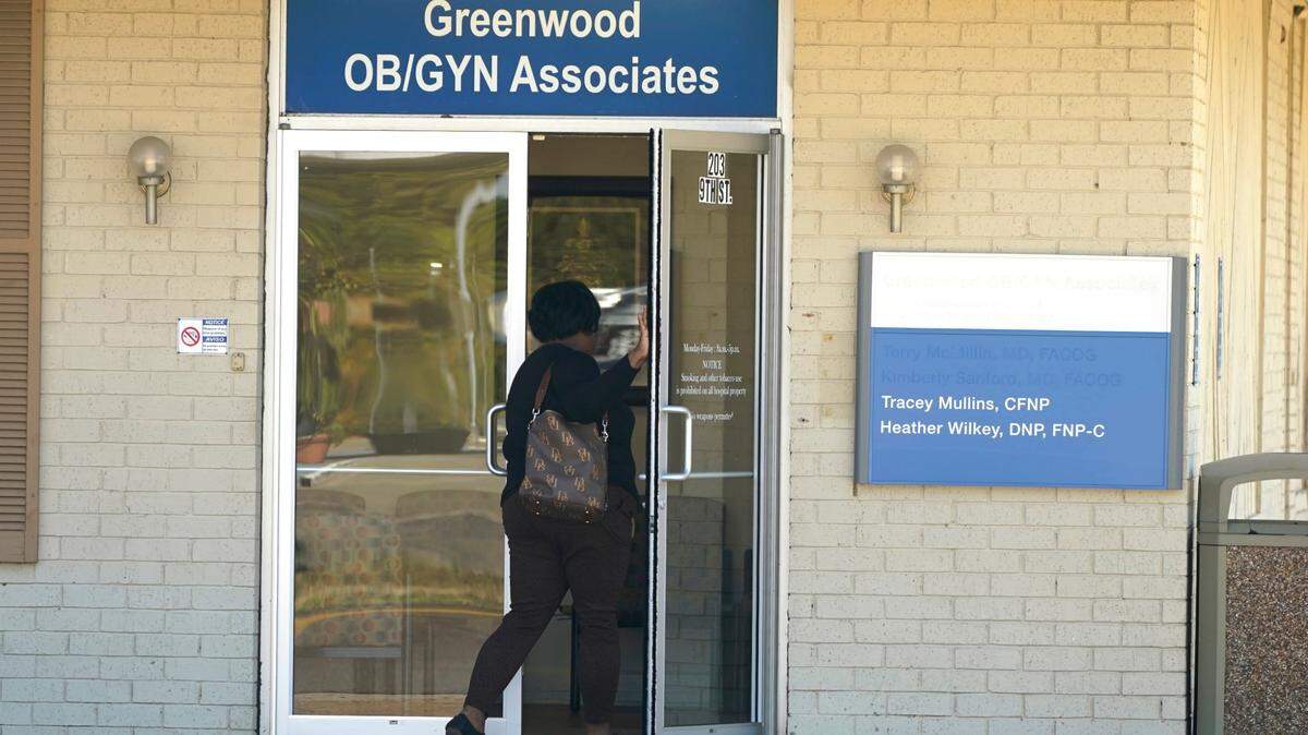 An individual enters the Greenwood OB/GYN Associates clinic across the street from the Greenwood Leflore Hospital in Greenwood, Miss., Oct. 21, 2022. (AP Photo/Rogelio V. Solis)