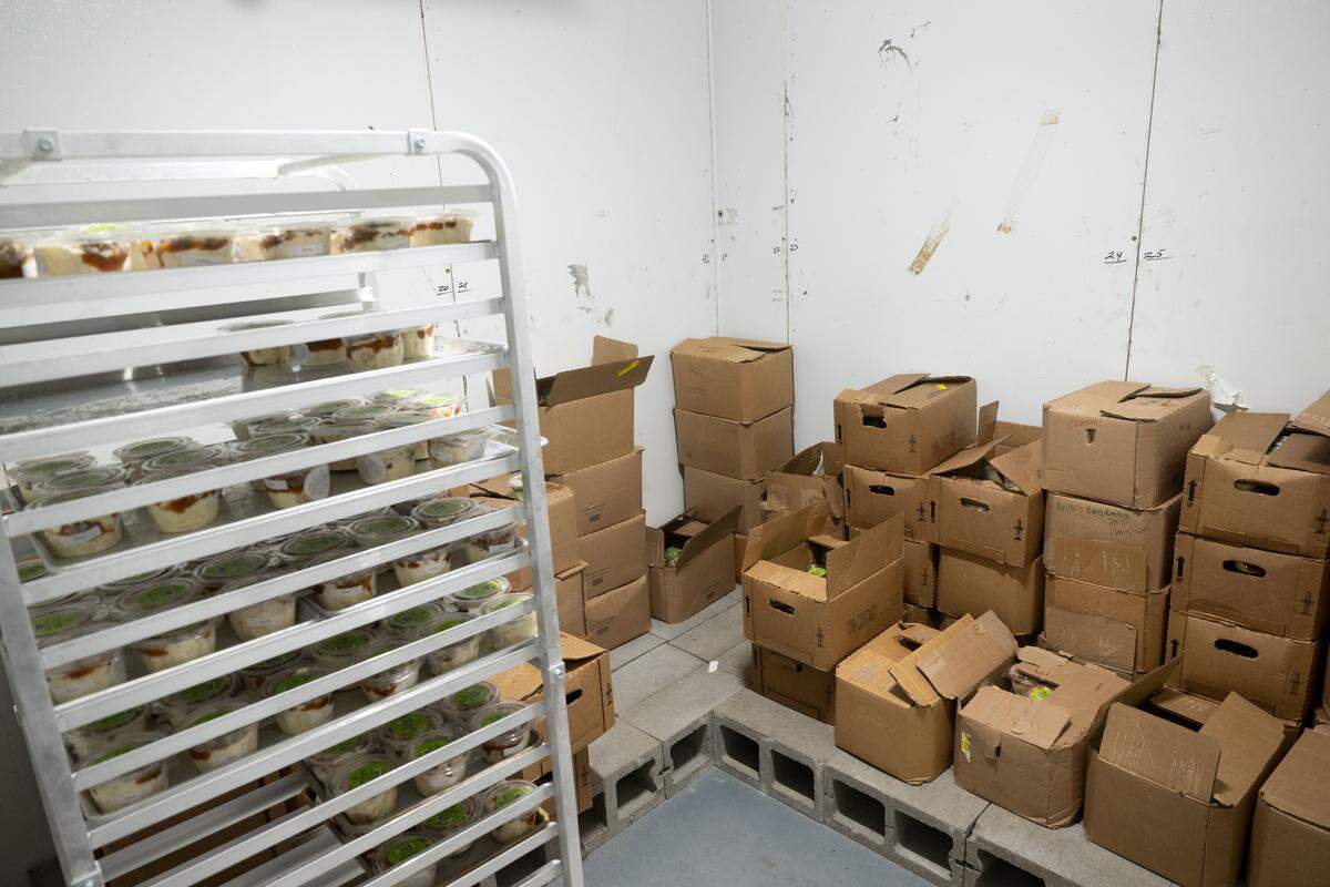 A freezer room fills with  boxes of frozen custard flavors at the Quakes distribution center in Vancleave.