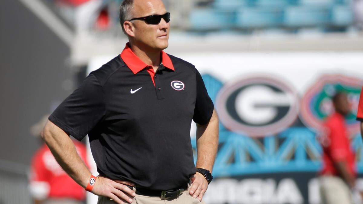 Georgia head coach Mark Richt watches his team warm up before an NCAA college football game against Florida, Saturday, Oct. 31, 2015, in Jacksonville, Fla. (AP Photo/John Raoux)